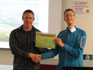 Greg (left) receives his Advanced Spirit of Success Certifikate from VP Education Timm (right).